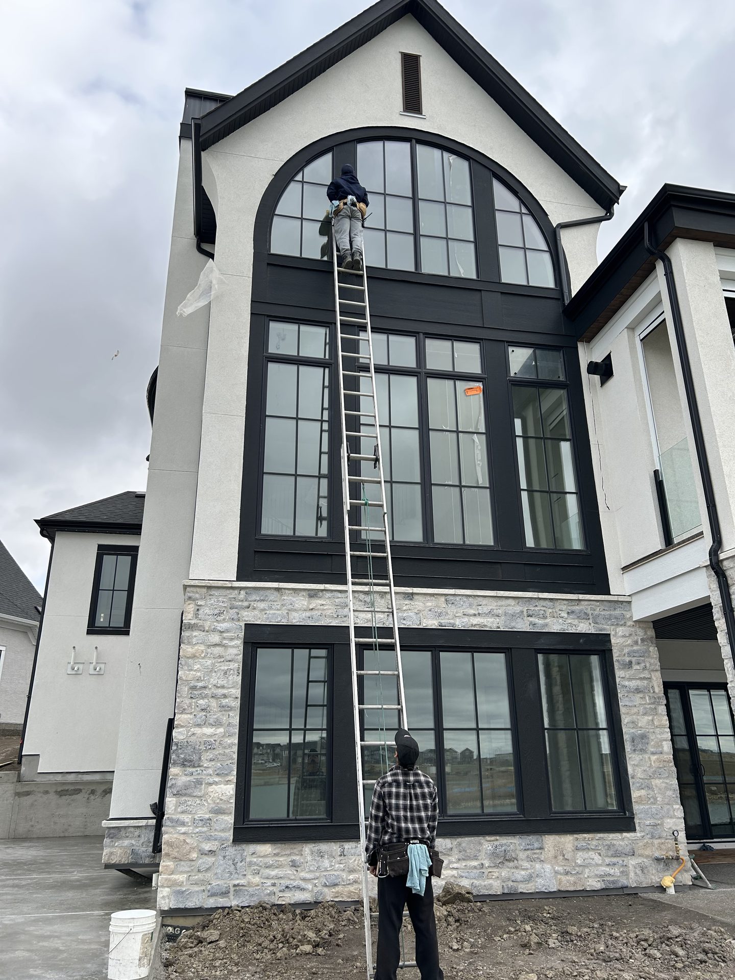 Window cleaning on a Calgary home